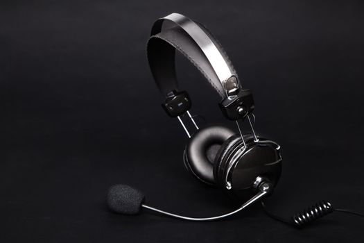 Modern headset on black background