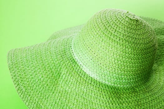 Summer ladies hat, green background