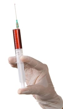 Nurse's hand holding a syringe, white background