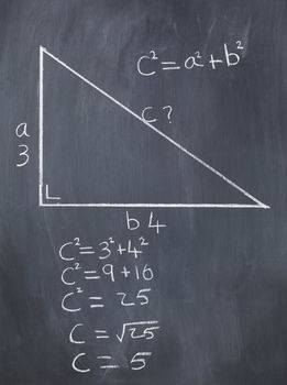 Right triangle with pythagorean formula and calculations on a blackboard