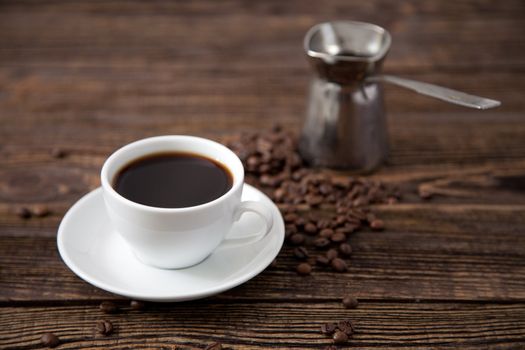 Cup of coffee on a wooden table