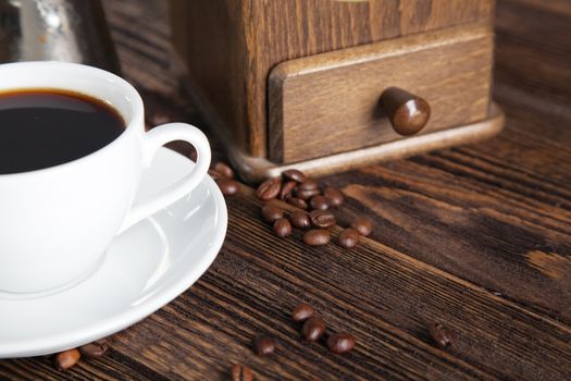 Cup of coffee on a wooden table