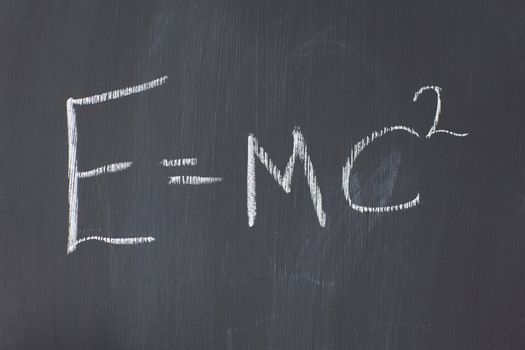 Blackboard with a formula written on it