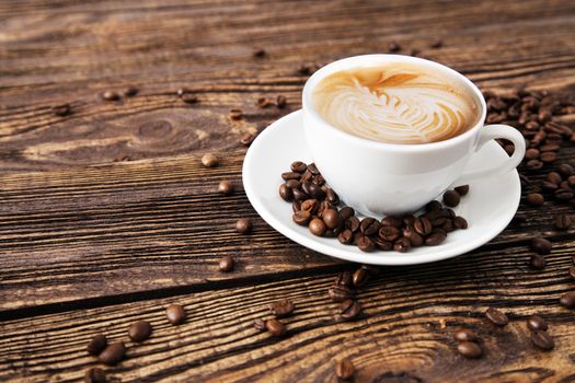 Cup of coffee on a wooden table