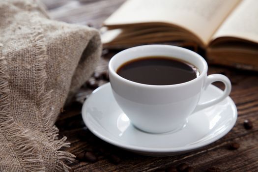 Cup of coffee on a wooden table