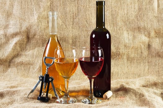 Wine and grapes on vintage background, studio photo