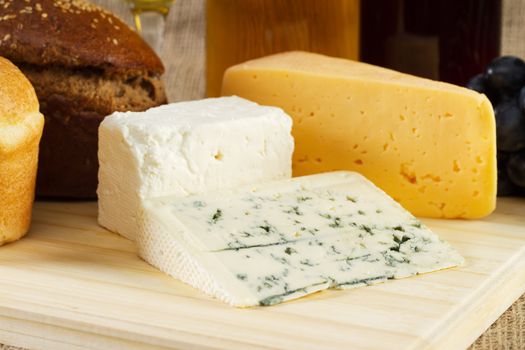 Bread and cheese on cloth background, studio photo