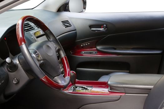 Interior of a luxury car with mahogany finish