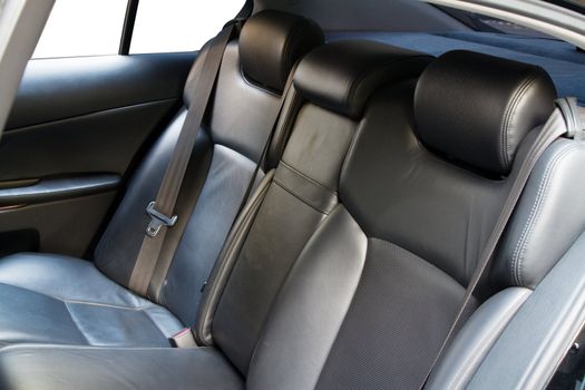 Leather back car seats with active headrest