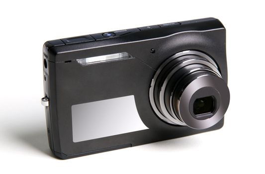 Digital photo camera on white background