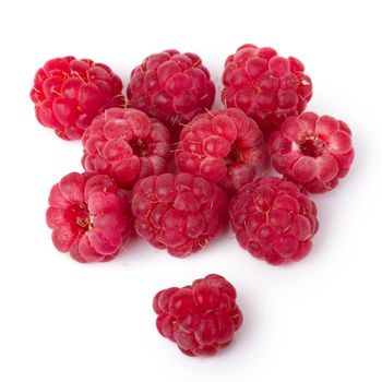 Ripe red raspberries isolated on white background