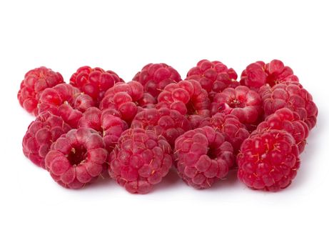 Ripe red raspberries isolated on white background