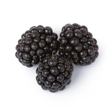 Ripe juicy blackberries isolated on white background