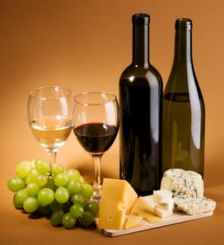 Wine and cheese still life