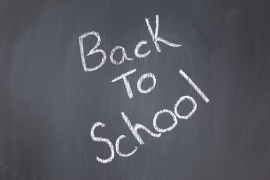 Blackboard with "back to school" written on it
