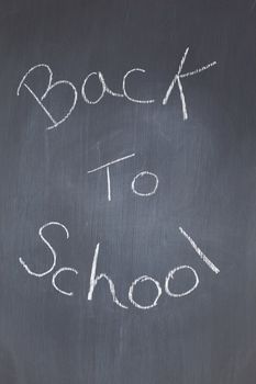 Blackboard with "back to school" written on it