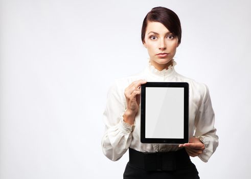 Attractive young woman with a tablet pc, white background