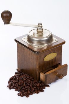 Vintage coffee grinder isolated on white background