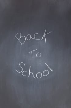 Blackboard with "back to school" written on it