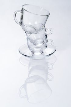 Glass cups studio photo, neutral background