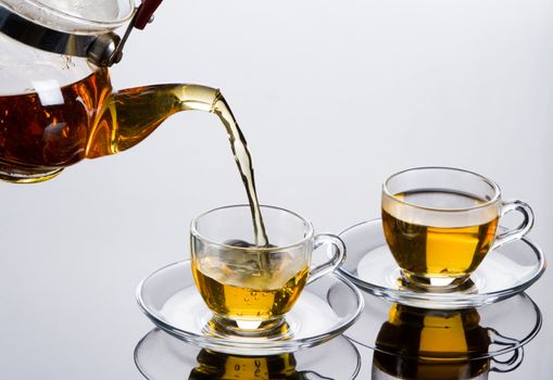 Tea cup with fresh mint leaves, closeup photo