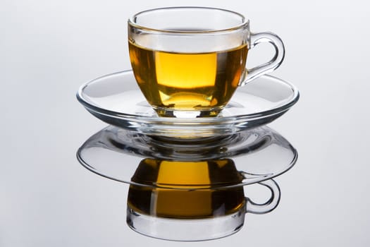 Tea cup with fresh mint leaves, closeup photo