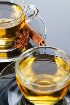 Tea cup with fresh mint leaves, closeup photo