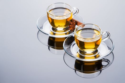 Tea cup with fresh mint leaves, closeup photo