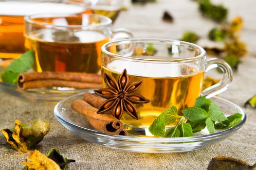 Tea cup with fresh mint leaves, closeup photo