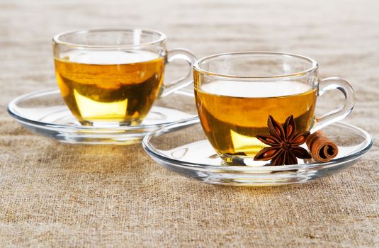 Tea cup with fresh mint leaves, closeup photo