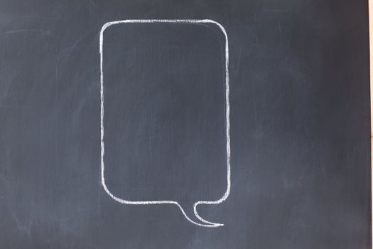 Empty rectangular comic strips balloon on a blackboard