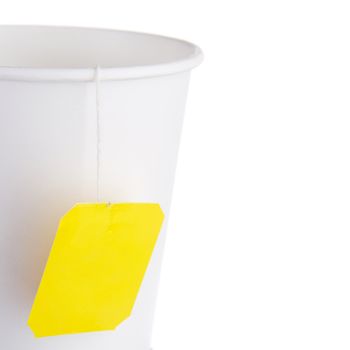 Paper cup of tea against white background
