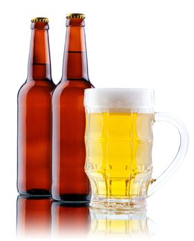 Beer mug and bottle isolated on white background, studio photo