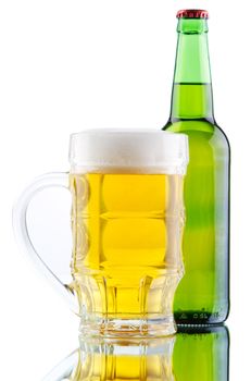 Beer mug and bottle isolated on white background, studio photo