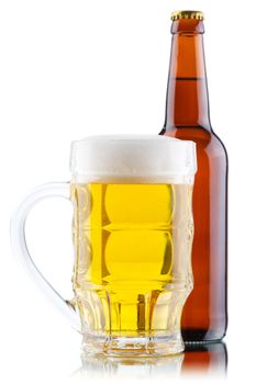 Beer mug and bottle isolated on white background, studio photo