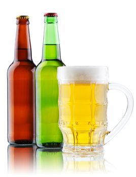 Beer mug and bottle isolated on white background, studio photo