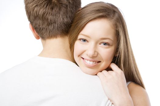 Beautiful girl leaning on boyfriend's shoulder, white background
