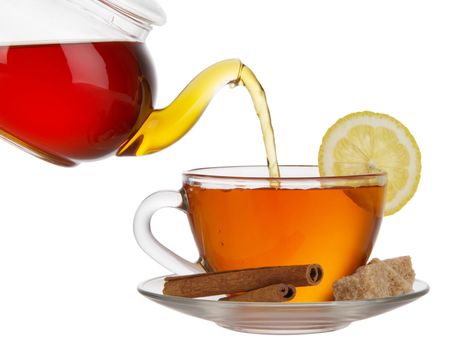 Black tea with cane-sugar, lemon and cinnamon