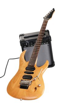 Electric guitar with amplifier, white background