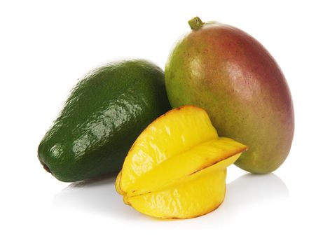 Mango, avocado and carambola on white background