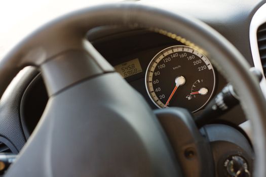 Illuminated dashboard and steering wheel of a modern car