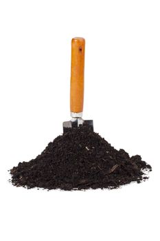 Close up image of garden shovel and soil against white background
