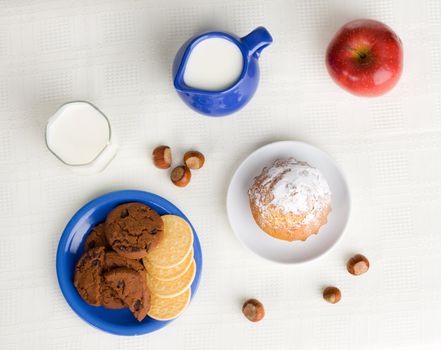 Healthy breakfast - milk, fruit and pastry