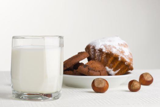Milk and hazelnuts still-life