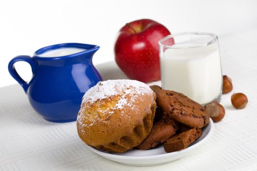 Healthy breakfast - milk, fruit and pastry