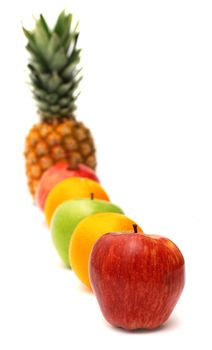 Row of bright fresh fruits isolated on white background