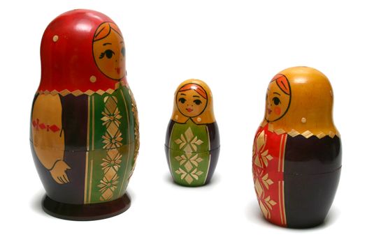 Three russian dolls isolated over white background