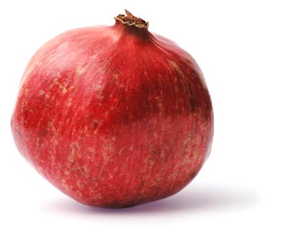 Neatly retouched pomegranate isolated on white background