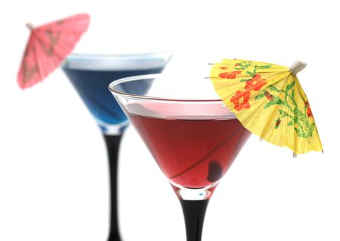 Two refreshing cocktails with umbrellas