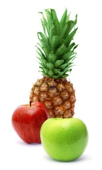Fresh pineapple and apples, isolated on white background